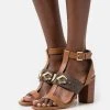 MICHAEL Michael Kors Damen IZZY T STRAP - High Heel Sandalette - Brown/multi-coloured -MICHAEL Michael Kors Verkaufsgeschäft 316fd16ad94b4258997862f8c113fd43