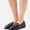 MICHAEL Michael Kors Damen APRIL LOAFER - Slipper - Black -MICHAEL Michael Kors Verkaufsgeschäft 3574a4940cbe4ddcbe0a4a54f4982e43