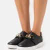 MICHAEL Michael Kors Damen KENNA - Sneaker Low - Black/gold -MICHAEL Michael Kors Verkaufsgeschäft 4e77dafb9bff4c25ba0443edcd0be7d5