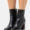 MICHAEL Michael Kors Damen MARCELLA FLEX BOOTIE - Stiefelette - Black -MICHAEL Michael Kors Verkaufsgeschäft 79725323b3394a04bad53c3ffd706f3d
